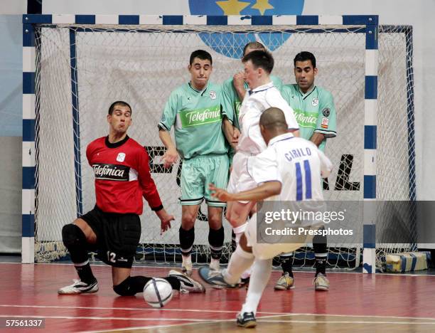 Sirilo of Dinamo Moscow competes against Rafa of Boomerang Interviu FS during UEFA Futsal Cup final on May 7, 2006 in Moscow, Russia.