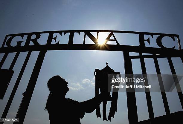 Brooks Mileson chairman of Gretna FC is seen with the Tennents Scottish FA Cup trophy at Raydale Park May 9 Gretna, Scotland. Gretna will face Hearts...