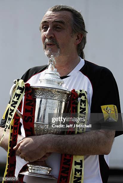 Brooks Mileson chairman of Gretna FC is seen with the Tennents Scottish FA Cup trophy at Raydale Park May 9 Gretna, Scotland. Gretna will face Hearts...