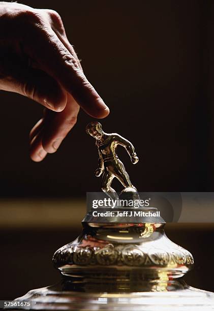 The Tennents Scottish FA Cup trophy is seen in the teams dressing room at Raydale Park May 9 Gretna, Scotland. Gretna will face Hearts at Hampden...