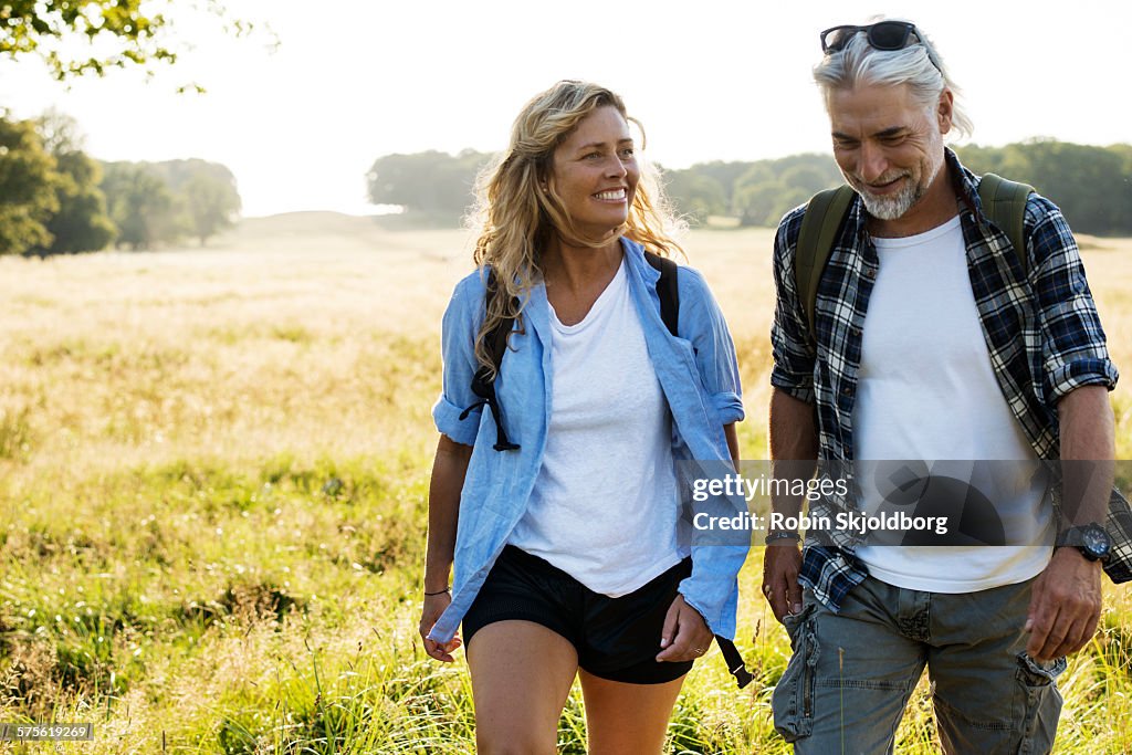 Smiling Mature Man and Woman hiking