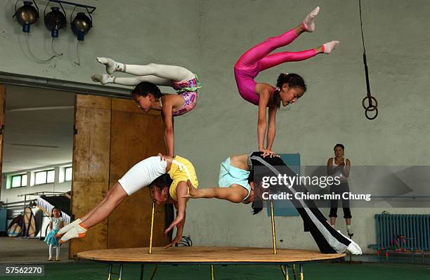 Students practice at the contortionist school in the Mongolian Circus July 18, 2005 in Ulaanbaatar, Mongolia.