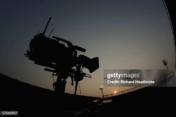 Camera is silhouetted as the sun dips behind a stand prior to the Coca Cola Championship Play-Off Semi-Final, Second Leg match between Watford and...