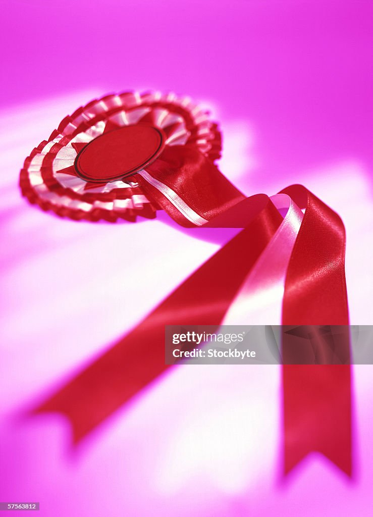 Close-up of a red award ribbon