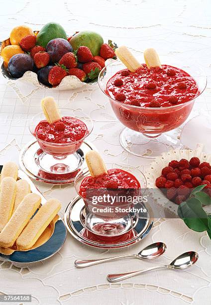 high angle view of raspberry sorbet served with cookies - raspberry sorbet stock pictures, royalty-free photos & images