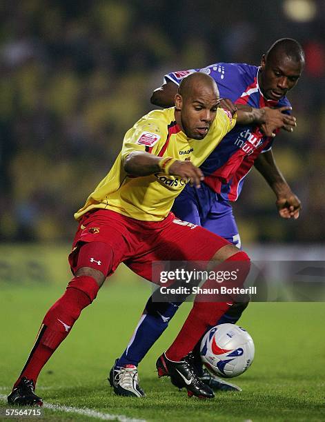 Marlon King of Watford holds off Emmerson Boyce of Crystal Palace during the Coca-Cola Championship Play-Off Semi-Final, Second Leg match between...