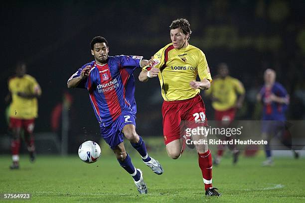 Jobi McAnuff of Crystal Palace tussles for posession with Darius Henderson of Watford during the Coca-Cola Championship Play-Off Semi-Final, Second...