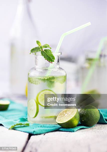 chilled lime juice with mint in glass. - soda lime mint stock pictures, royalty-free photos & images