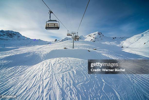 chairlift - ski ressort in the alps - swiss alps resort stock pictures, royalty-free photos & images