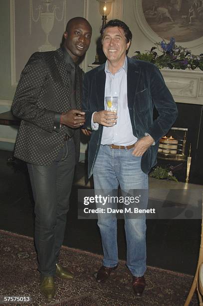 Oswald Boetang and Bryan Ferry attend a surprise party hosted by watch designer Stephen Webster to celebrate his 30th year in the jewellery business,...