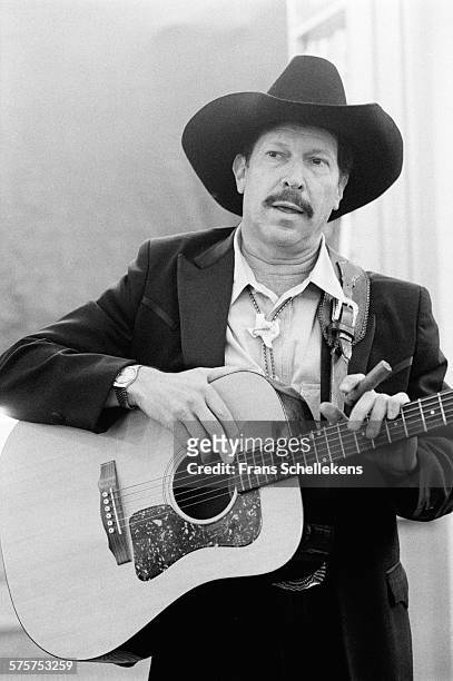 Crime writer Kinky Friedman, vocals and guitar, performs at H.W. Smith bookstore on June 20th 1993 in Amsterdam, Netherlands.