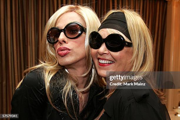 Actresses Alexis Arquette and Roseanne Barr attend the AFI Associates luncheon honoring Hollywood's Arquette family with the 6th Annual "Platinum...