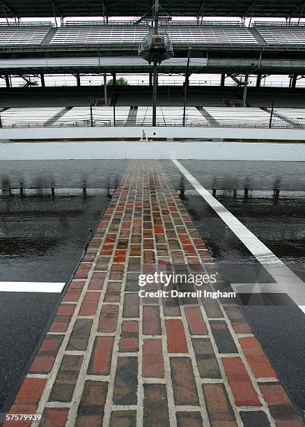 Generic view of the famous yard of brick on the start finish line as rain stops practice for the IRL IndyCar Series 90th running of the Indianapolis...