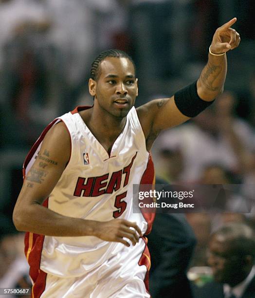 Derek Anderson of the Miami Heat points toward the bench after extending a commanding lead with a three-point basket in the second quarter against...