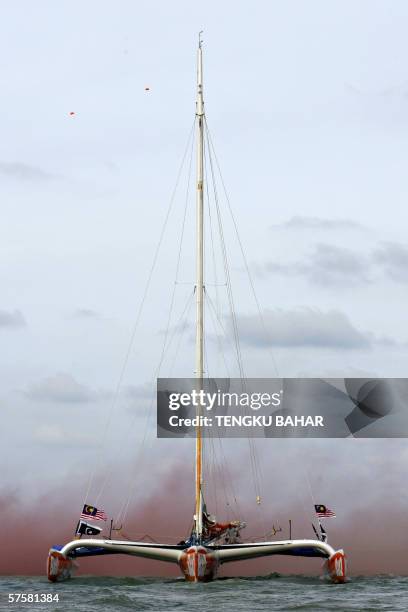 Kuala Terengganu, MALAYSIA: TO GO WITH "Yachting-Asia-MacArthur-sports,FEATURE" This photo taken 07 May 2006 shows the B&Q trimaran carrying...