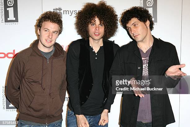 Andrew Stockdale, Chris Ross and Myles Heskler of Wolfmother arrive at the Scarface: The World is Yours Video Game Launch Party at the Vangaurd on...