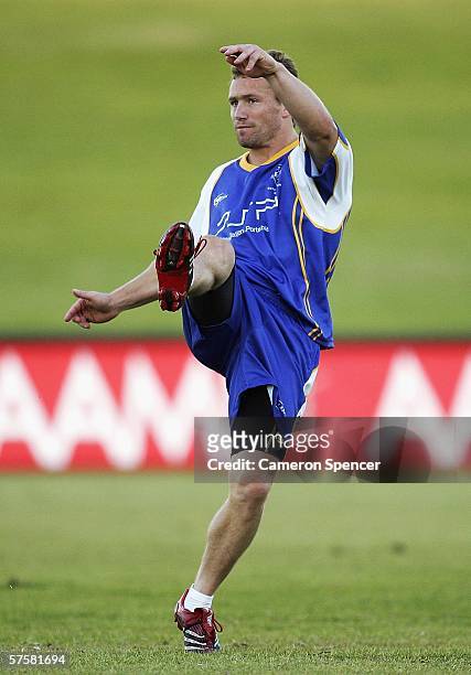 Matt Orford of the City Origin team kicks the ball during a City Origin training session at Apex Oval May 11, 2006 in Dubbo, Australia.