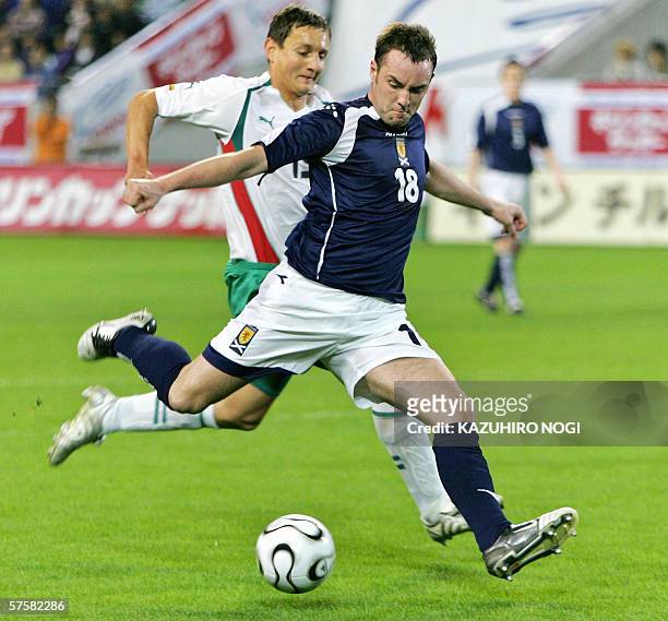 Scotand's forward Kris Boyd prepares to shoot the ball in the first half of the Kirin Cup football match against Bulgaria at the Kobe Wing Stadium,...