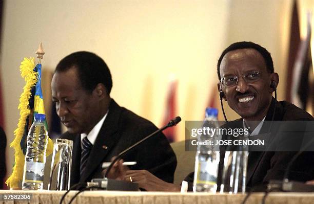 Burkina Faso President Blaise Compaore and his Rwandan counterpart Paul Kagame attend 11 May 2006 the closing session of the sixth Africa Governance...