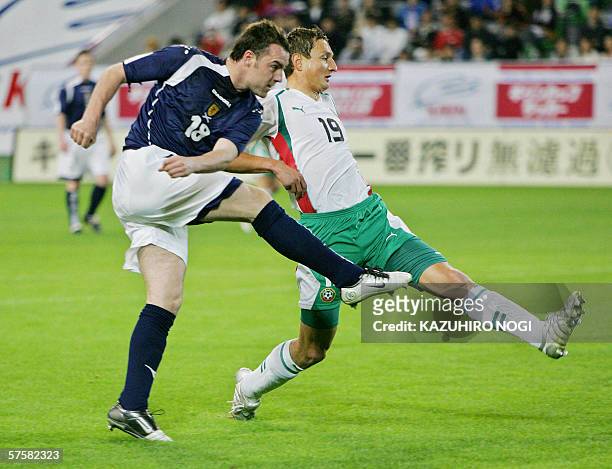 Soctoland's forward Kris Boyd shoots the ball in the first half of the Kirin Cup football match against Bulgaria at the Kobe Wing Stadium, 11 May...