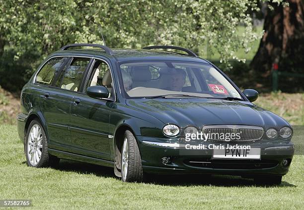 Queen Elizabeth II is seen in her car as she watches Lady Penny Brabourne compete in the Land Rover International Driving Grand Prix on May 11, 2006...