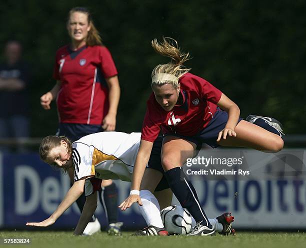 Corina Schroeder of Germany and Allie Long of the USA battle for the ball during the friendly match between the Women German Under 21 team and the...