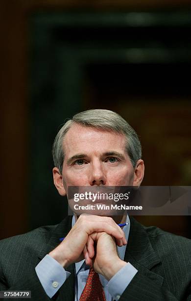 Robert Portman, the nominee for the position of director of the Office of Management and Budget, listens to opening statements during his...