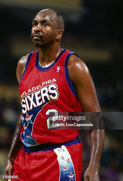 Moses Malone of the Philadelphia 76ers looks on during a game against the Boston Celtics at the Boston Garden on October 27, 1993 in Boston,...