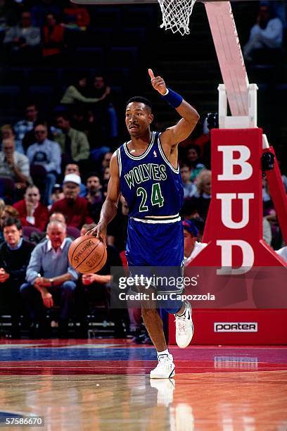 Michael Williams of the Minnesota Timberwolves dribbles the ball up court during a game against the Detroit Pistons at the Palace of Auburn Hills on...