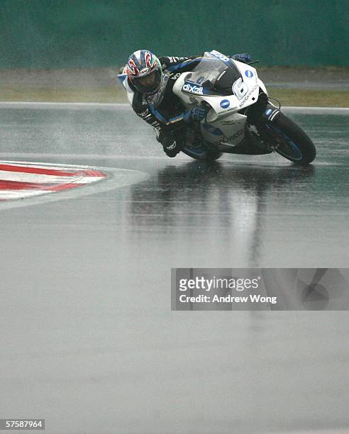 Japanese rider Makoto Tamada of Konica Minolta Honda turns a corner during the practice session at the China MotoGP on May 12, 2006 in Shanghai,...
