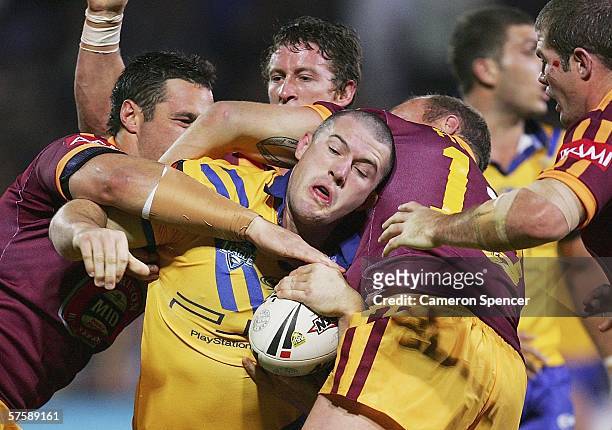 Paul Gallen of City is tackled during the NRL City v Country Origin match at Apex Oval May 12, 2006 in Dubbo, Australia.