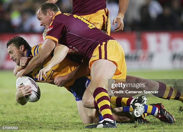 Matt Orford of City is tackled during the NRL City v Country Origin match at Apex Oval May 12, 2006 in Dubbo, Australia.