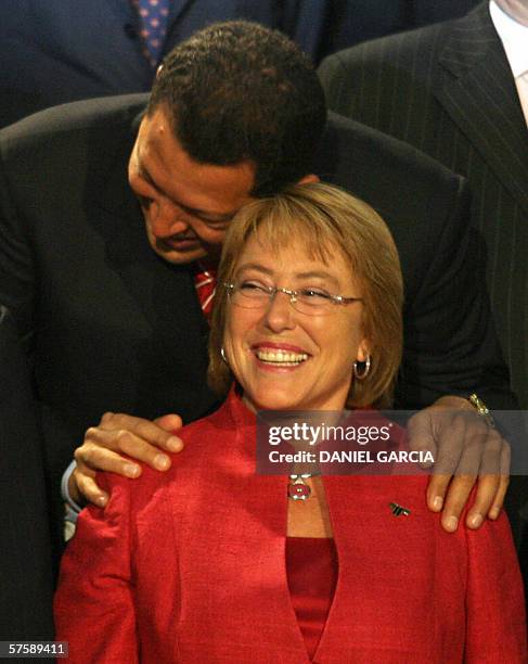 Venezuelan President Hugo Chavez shares a laugh with Chile's President Michelle Bachelet during the family picture of the EU-LAC Heads of State and...