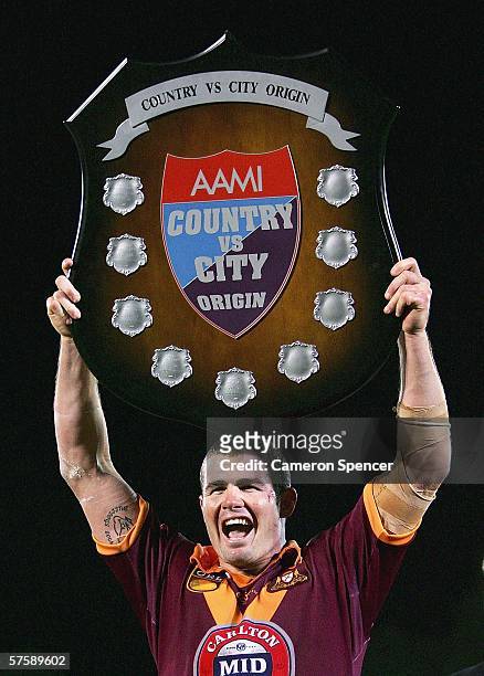 Country captain Andrew Ryan lifts the trophy after the Country team's victory in the NRL City v Country Origin match at Apex Oval May 12, 2006 in...