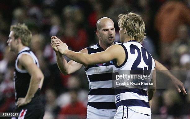 Paul Chapman and Gary Ablett of the Cats celebrate a goal during the round seven AFL match between the St Kilda Saints and the Geelong Cats at the...