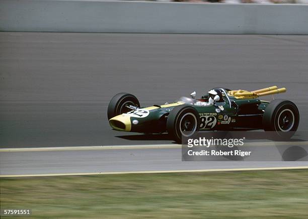 Scottish Formula One race car driver Jim Clark races in the Indianapolis 500 auto race in his Ford-build Lotus 38 at Indianapolis Motor Speedway, May...