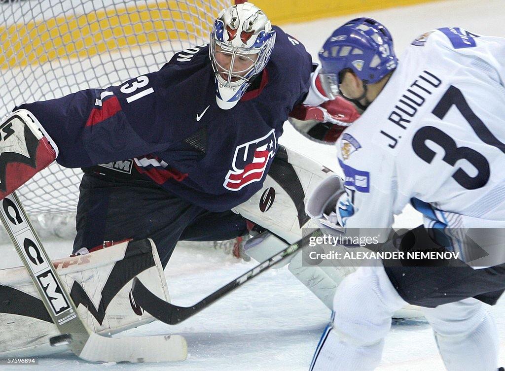 Finland's Jarkko Ruutu attacks US goalie