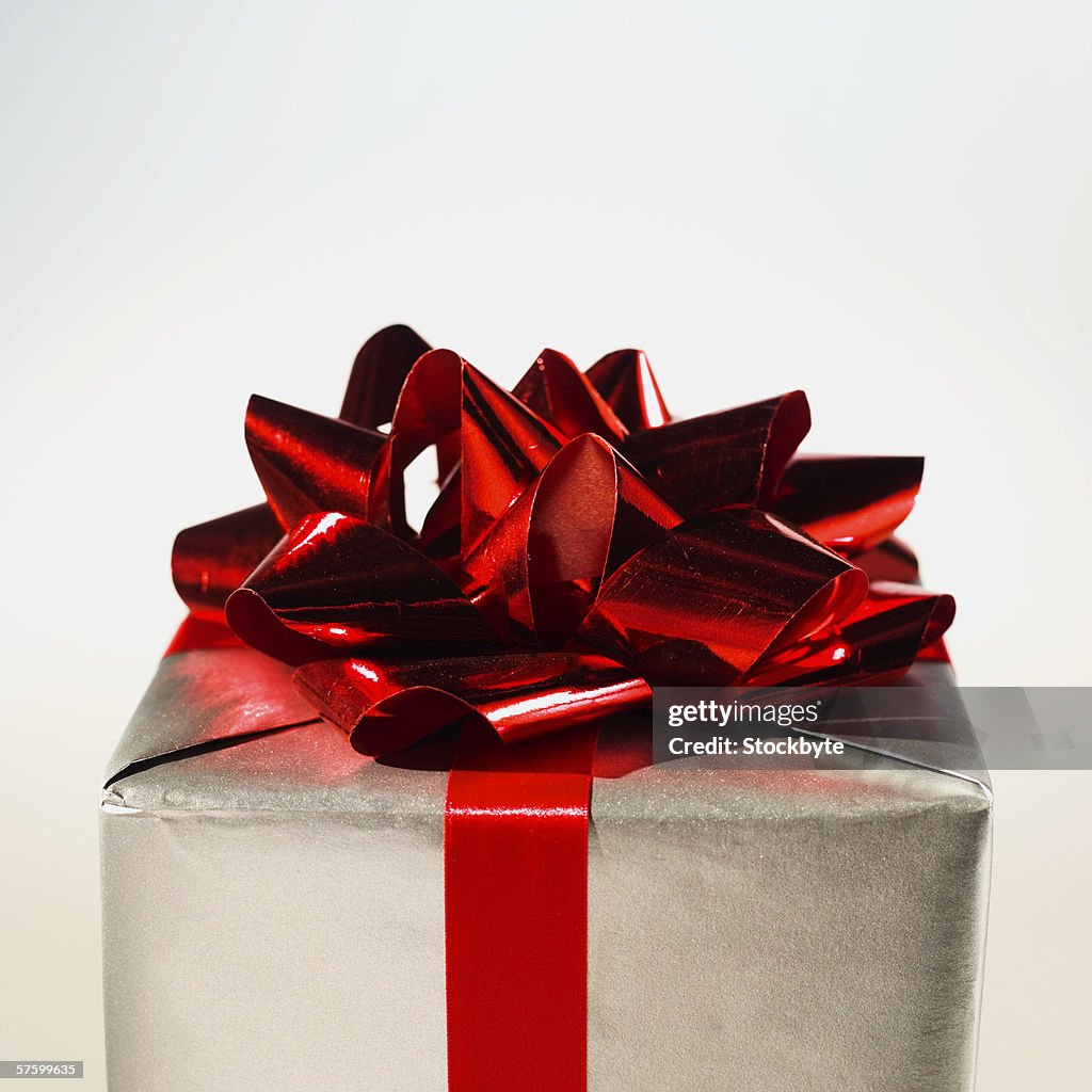 Close-up of wrapped present with bow