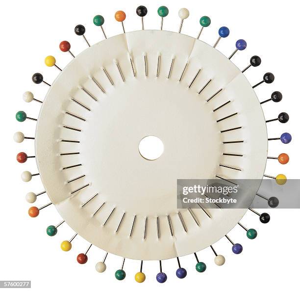 array of colored pins - pin cushion stock pictures, royalty-free photos & images