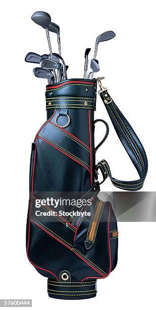 golf clubs in a leather golf bag - bolsa de golf fotografías e imágenes de stock