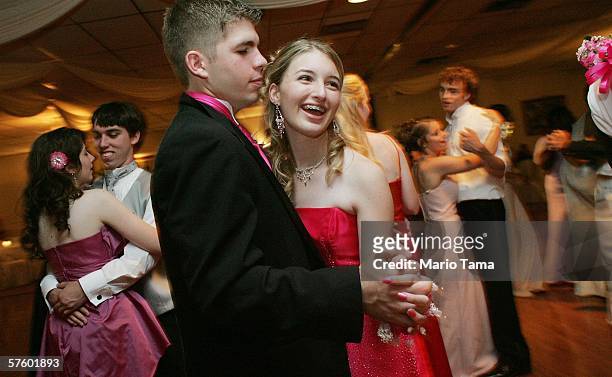 Cabrini High School junior Danielle DiMaggio and boyfriend Ben Navo dance at the Cabrini High School prom May 12, 2006 in New Orleans, Louisiana....