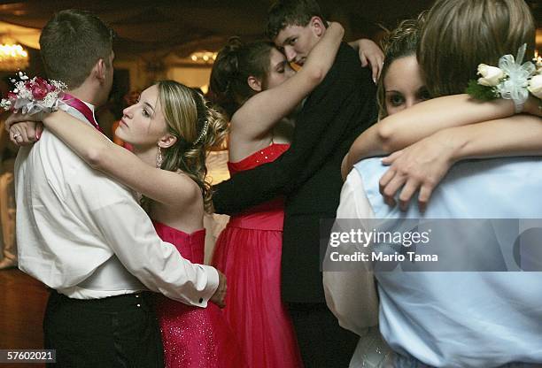 Cabrini High School junior Danielle DiMaggio and boyfriend Ben Navo dance at the Cabrini High School prom May 12, 2006 in New Orleans, Louisiana....