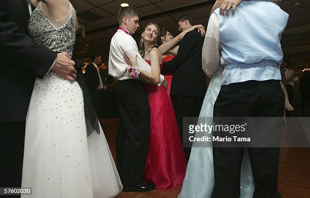 Cabrini High School junior Danielle DiMaggio and boyfriend Ben Navo dance at the Cabrini High School prom May 12, 2006 in New Orleans, Louisiana....