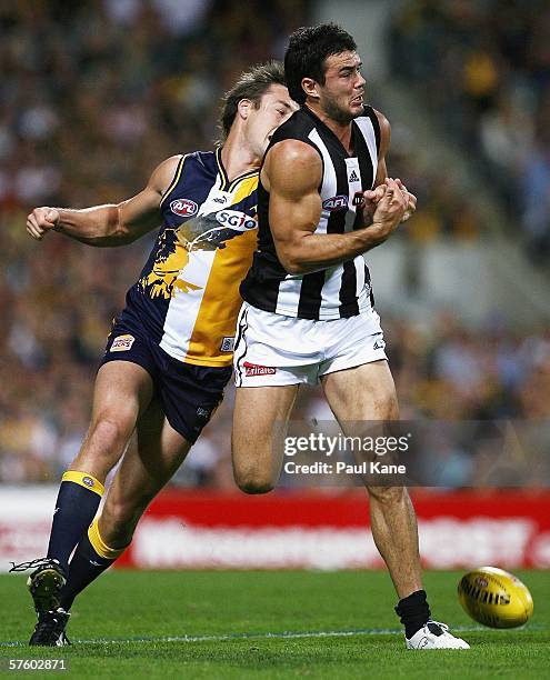 Adam Hunter of the Eagles spoils Chris Tarrant of the Magpies during the round seven AFL match between the West Coast Eagles and the Collingwood...