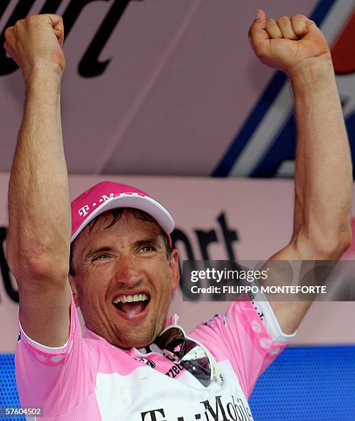 Ukraine's Serguei Gonchar of team T-Mobile jubilates as he wears the Pink Jersey of the overall leader after the seventh stage of the Giro D'Italia...