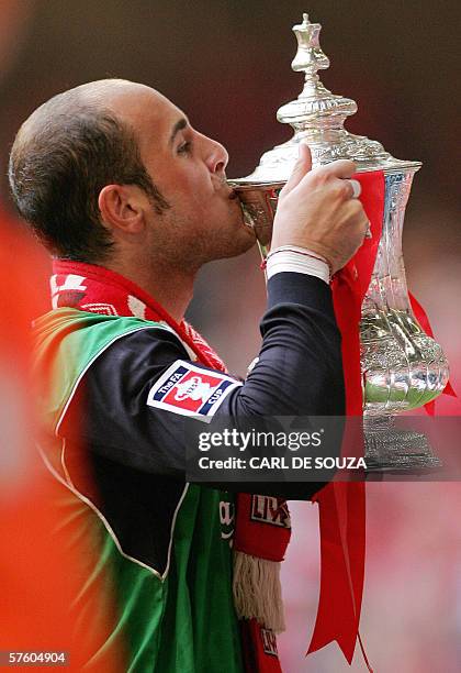 United Kingdom: Liverpool goalkeeper Jose Reina kisses the FA Cup after Liverpool beat West Ham 3-1 on penalties during the FA Cup final at the...