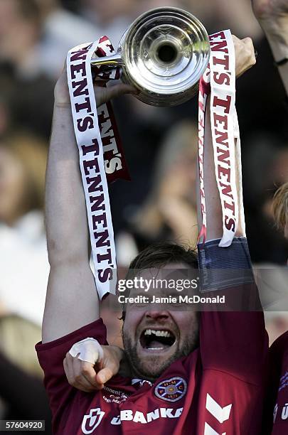 Hearts captain Steven Pressley lifts the Tennents Scottish Cup during the Tennents Scottish Cup Final between Heart of Midlothian and Gretna at...
