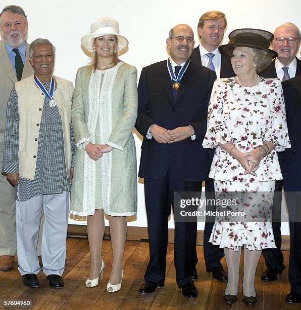 Muhammad Yunus, Princess Maxima, Mohamed Albaradei, Dutch Crown Prince Willem Alexander and Dutch Queen Beatrix pose for a picture after the Four...