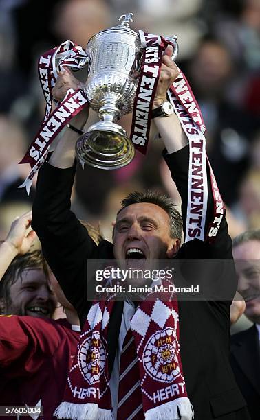 Hearts manager Valdas Ivanauskas lifts the Tennents Scottish Cup during the Tennents Scottish Cup Final between Heart of Midlothian and Gretna at...