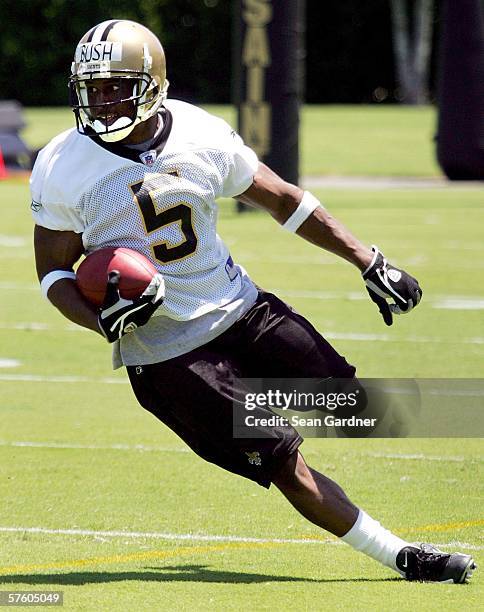 Rookie running back Reggie Bush of the New Orleans Saints practices during Rookie Camp on May 13, 2006 at the Saints Training Facility in Metairie,...